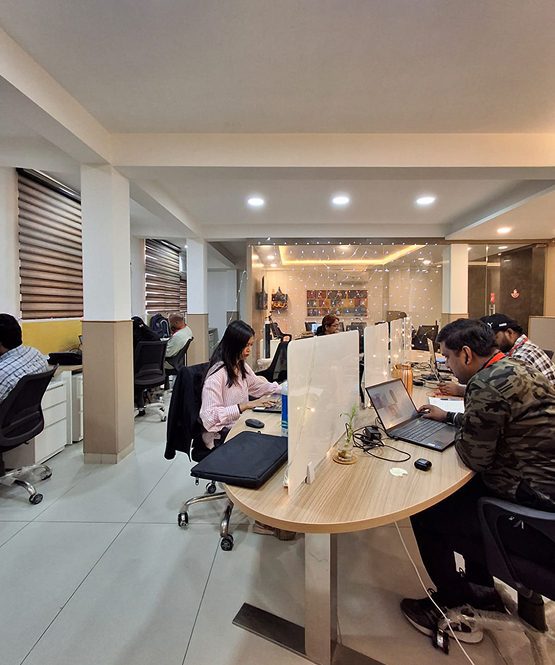 Wisitech's 25+ person delivery team working in their India office, highlighting 26+ years of reliable white-label partnerships and strategic timezone coverage for global agencies.
