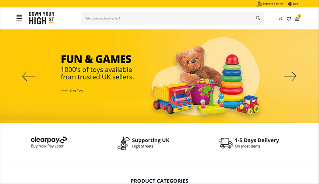 Screenshot of the Down Your High Street e-commerce website homepage, featuring a colorful "FUN & GAMES" section and various children's products, reflecting its focus as a multi-vendor marketplace for toys and gifts.