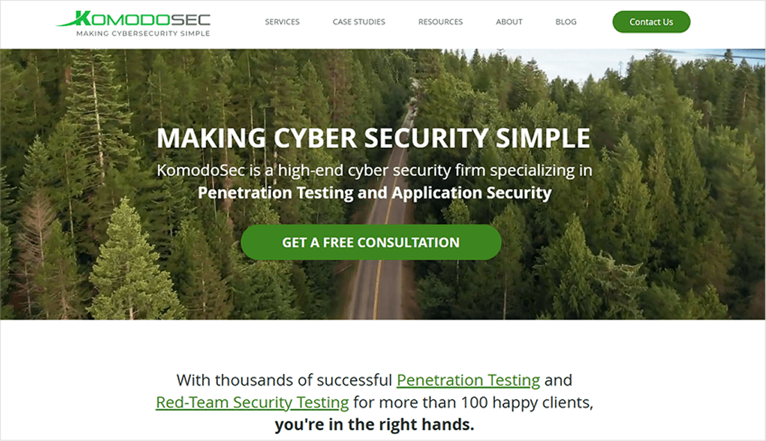 Screenshot of the KomodoSec website banner with the slogan "Making Cyber Security Simple" over an image of a forest, reflecting a focus on clear, simple cybersecurity solutions.