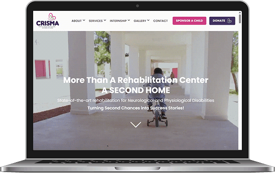 A laptop displaying the improved CRISMA website on the screen, highlighting the functional and visual success of the digital marketing project.