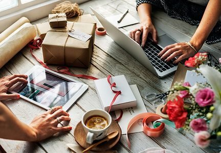 Wisitech portfolio: Image representing Etsy seller services, showing hands preparing handcrafted goods for shipping, demonstrating marketplace optimization.
