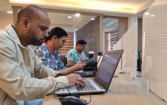 Wisitech web developers working on client projects, offering dedicated web development services for Canadian businesses